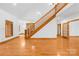 Elegant wooden staircase with hardwood floors at 2510 Burton Estates Ln, Lincolnton, NC 28092