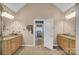 Elegant bathroom with double vanities and a view into a bedroom at 3613 Savannah Way, Monroe, NC 28110