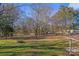 Large backyard with mature trees and grassy area at 4331 Sulphur Springs Ne Rd, Hickory, NC 28601