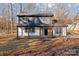 Two-story home with a modern, farmhouse-style exterior at 5400 Larewood Dr, Charlotte, NC 28215