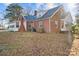 Brick house with sunroom and screened porch at 7503 Albemarle Rd, Charlotte, NC 28227