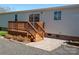 Back exterior with wooden deck and patio area at 816 Perry Rd, Troutman, NC 28166
