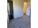Carpeted bedroom with access to a private bathroom at 816 Perry Rd, Troutman, NC 28166