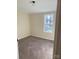 Bright and airy bedroom with a large window and neutral decor at 816 Perry Rd, Troutman, NC 28166