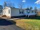 Single story home with large front yard at 816 Perry Rd, Troutman, NC 28166
