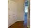 Bright hallway with built-in storage and wood flooring at 816 Perry Rd, Troutman, NC 28166