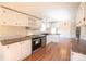 Modern kitchen featuring white cabinets and stainless steel appliances at 816 Perry Rd, Troutman, NC 28166