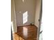 Laundry area with wood flooring and natural light at 816 Perry Rd, Troutman, NC 28166