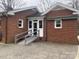 Brick home with patio, ramp, and spacious backyard at 936 N 5Th St, Albemarle, NC 28001
