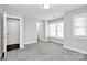 Spacious bedroom with gray carpet and neutral walls at 1420 W 4Th St, Charlotte, NC 28208