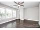 Bright bedroom with hardwood floors and large windows at 1420 W 4Th St, Charlotte, NC 28208