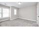 Cozy bedroom with carpet and neutral walls at 1420 W 4Th St, Charlotte, NC 28208
