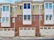 Townhouse with three-car garage and brick facade at 1420 W 4Th St, Charlotte, NC 28208