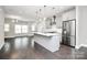 Modern kitchen with stainless steel appliances and an island at 1420 W 4Th St, Charlotte, NC 28208