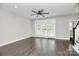 Living room with dark hardwood floors and access to a patio at 1420 W 4Th St, Charlotte, NC 28208
