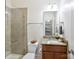 Clean bathroom, granite vanity, shower, toilet at 250 Kenway Loop, Mooresville, NC 28117