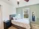 Light and airy bedroom with single bed and backyard view at 250 Kenway Loop, Mooresville, NC 28117