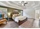 Main bedroom with a ceiling fan and large windows at 250 Kenway Loop, Mooresville, NC 28117