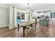 Kitchen features a breakfast nook, stainless steel appliances, and pool view at 250 Kenway Loop, Mooresville, NC 28117