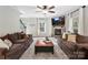 Spacious living room features a stone fireplace and comfortable seating at 250 Kenway Loop, Mooresville, NC 28117