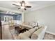 Open living room with adjoining dining area and neutral decor at 250 Kenway Loop, Mooresville, NC 28117