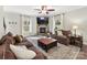 Spacious living room with a stone fireplace and large TV at 250 Kenway Loop, Mooresville, NC 28117
