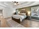 Spacious main bedroom with wood flooring and large windows at 250 Kenway Loop, Mooresville, NC 28117