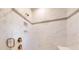 Large shower with marble tile and built-in shelves at 8919 Clavemorr Glenn Ct, Charlotte, NC 28226