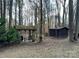 Backyard with shed, arbor, and wooded area at 190 Heathergate Ln, Stanley, NC 28164