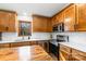 Kitchen with stainless steel appliances and white tile at 190 Heathergate Ln, Stanley, NC 28164