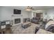 Living room with fireplace, leather couches and wood floors at 200 Edel St, Kings Mountain, NC 28086