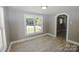 Spacious dining area with tile floors and access to kitchen at 2430 Sunset Ave, Gastonia, NC 28052