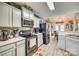 Well-equipped kitchen with stainless steel appliances and farmhouse-style decor at 4136 Shasta Cir, Clover, SC 29710