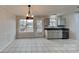 Bright eat-in kitchen with granite counters and stainless steel appliances at 4940 Hathwyck Nw Ct, Concord, NC 28027