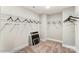 Large walk-in closet with ample hanging space and shelving at 5124 Heathland Dr # 78, Charlotte, NC 28215