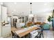 Open concept kitchen and dining area with island and hardwood floors at 5124 Heathland Dr # 78, Charlotte, NC 28215