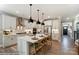 Modern kitchen with white cabinets, island, and stainless steel appliances at 5124 Heathland Dr # 78, Charlotte, NC 28215