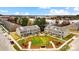 Aerial view of community with green space and townhomes at 5552 Stafford Rd # 28, Charlotte, NC 28215