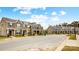 Exterior view of charming townhouses with landscaping at 5552 Stafford Rd # 28, Charlotte, NC 28215