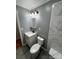 Updated bathroom with a modern vanity and marble shower at 604 Eastwood Dr, Albemarle, NC 28001