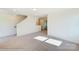 Carpeted bedroom with natural light at 2024 Embassy Ct # 49, Charlotte, NC 28213
