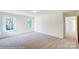 Well-lit bedroom with access to bathroom at 2024 Embassy Ct # 49, Charlotte, NC 28213