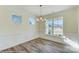 Elegant dining room with hardwood floors and chandelier at 2024 Embassy Ct # 49, Charlotte, NC 28213