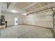 Unfinished garage with overhead door at 2024 Embassy Ct # 49, Charlotte, NC 28213