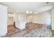 Open concept kitchen features island and hardwood floors at 2024 Embassy Ct # 49, Charlotte, NC 28213