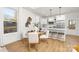 Modern white kitchen with island and stainless steel appliances at 204-1 Starview Ln, Dallas, NC 28034