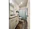 Clean bathroom with shower/tub combo and updated vanity at 3100 Glacier Ct, Gastonia, NC 28056
