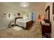 Cozy bedroom with double bed, dresser and decorative lighting at 3100 Glacier Ct, Gastonia, NC 28056