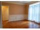 Bright dining room with hardwood floors and large window at 4518 Burrenfort Dr, Denver, NC 28037