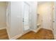 Bright entryway with built-in bench seating and exterior access at 7542 Waverly Walk Ave # 7542, Charlotte, NC 28277